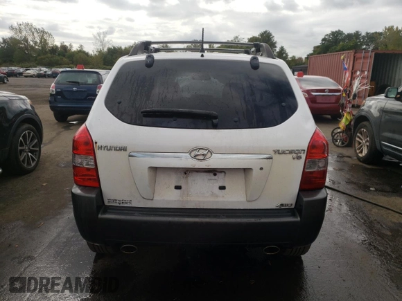 2007 Hyundai Tucson SE with VIN KM8JN72D27U569221, listed as a Copart auction lot 74250944 with 195,097 mi miles and Salvage Title. Bid and sale history available at carsss.com. Image 6.