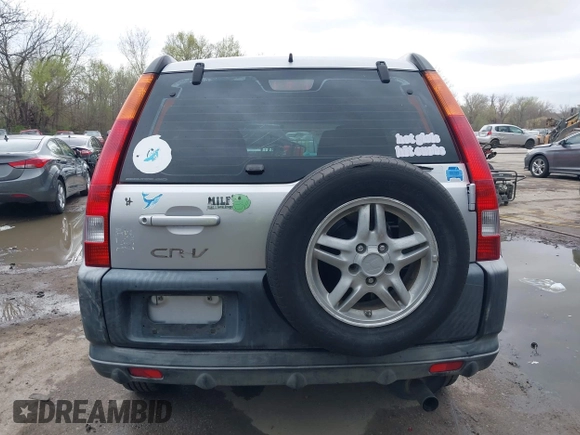 2002 Honda CR-V LX z VIN JHLRD78402C077631, wystawiony jako IAAI lot #41918750 z przebiegiem 186 827 mil mil oraz . Historia ofert i sprzedaży dostępna na DreamBid. Obrazek 16.