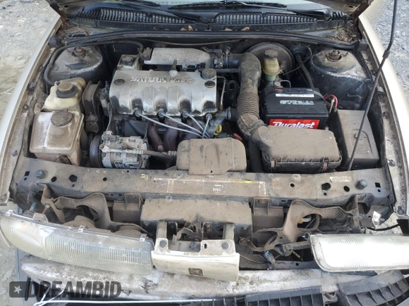 1997 Saturn SL with VIN 1G8ZH5285VZ365951, listed as a Copart auction lot 70902264 with 104,781 mi miles and Salvage Title. Bid and sale history available at carsss.com. Image 13.
