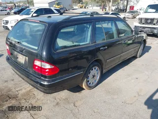 2001 Mercedes-Benz E-Class with VIN WDBJH65J31B381879, listed as a IAAI auction lot 41855504 with 153,667 mi miles. Bid and sale history available at carsss.com. Image 4.