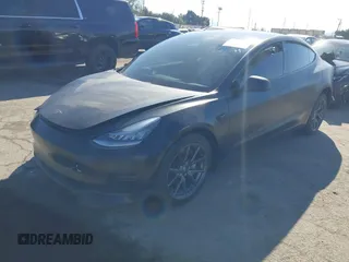 2019 Tesla Model 3 Mid Range with VIN 5YJ3E1EA0KF509547, listed as a IAAI auction lot 40720566 with 41,655 mi miles and . Bid and sale history available at DreamBid. Image 2.