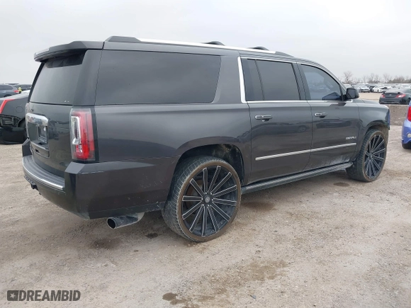2016 GMC Yukon XL Denali with VIN 1GKS1HKJ7GR186012, listed as a IAAI auction lot 41473177 with 156,280 mi miles. Bid and sale history available at carsss.com. Image 4.