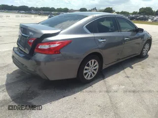 2016 Nissan Altima SR with VIN 1N4AL3AP9GC152060, listed as a IAAI auction lot 41696104 with 111,478 mi miles and . Bid and sale history available at carsss.com. Image 4.