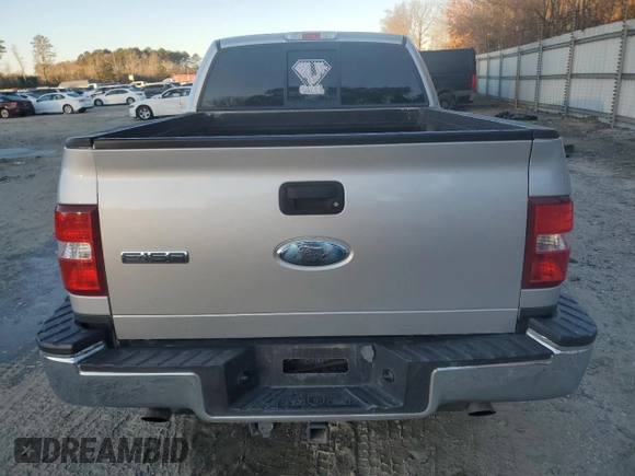 2006 Ford F-150 XLT with VIN 1FTPX04596KB93701, listed as a Copart auction lot 87672425 with 102,128 mi miles and Salvage title. Bid and sale history available at DreamBid. Image 6.