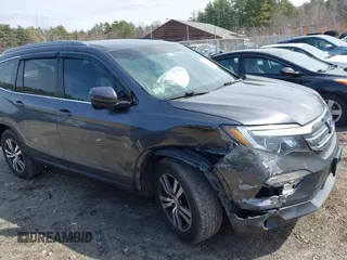 2017 Honda Pilot EX-L with VIN 5FNYF6H5XHB009029, listed as a IAAI auction lot 41883366 with 95,711 mi miles and . Bid and sale history available at DreamBid. Image 13.