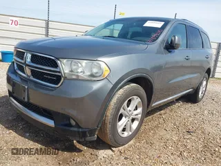 2011 Dodge Durango Crew with VIN 1D4RD4GG3BC729393, listed as a IAAI auction lot 41899010 with 174,392 mi miles and . Bid and sale history available at carsss.com. Image 2.