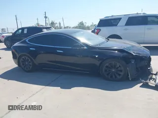 2020 Tesla Model S Long Range with VIN 5YJSA1E27LF397346, listed as a IAAI auction lot 40579015 with 43,779 mi miles and . Bid and sale history available at DreamBid. Image 13.