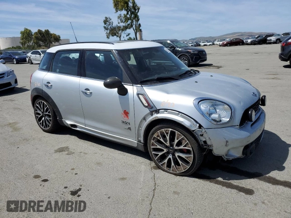 2014 MINI Countryman John Cooper Works with VIN WMWXD1C54EWS34594, listed as a Copart auction lot 55201045 with 94,899 mi miles and Salvage Title. Bid and sale history available at DreamBid. Image 4.