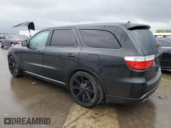 2013 Dodge Durango R/T with VIN 1C4SDHCTXDC520650, listed as a Copart auction lot 49253535 with 146,201 mi miles and Clean title. Bid and sale history available at DreamBid. Image 2.
