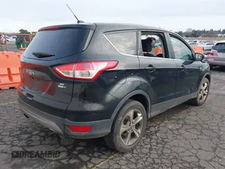 2016 Ford Escape SE with VIN 1FMCU9G97GUA30718, listed as a IAAI auction lot 41516857 with 167,576 mi miles and . Bid and sale history available at DreamBid. Image 4.