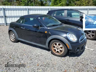 2013 MINI Cooper Coupe with VIN WMWSX1C54DT507731, listed as a Copart auction lot 49261315 with 111,881 mi miles and Clean Title. Bid and sale history available at carsss.com. Image 4.