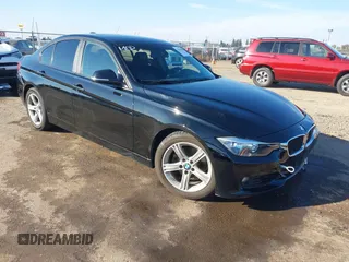 2014 BMW 3 Series 328i with VIN WBA3C1C55EK117180, listed as a IAAI auction lot 41389969 with 163,760 mi miles. Bid and sale history available at carsss.com. Image 1.
