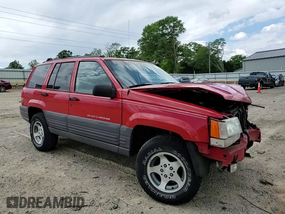 1997 Jeep Grand Cherokee Laredo with VIN 1J4GZ58S3VC739922, listed as a Copart auction lot 55667885 with 209,075 mi miles and Salvage title. Bid and sale history available at DreamBid. Image 15.