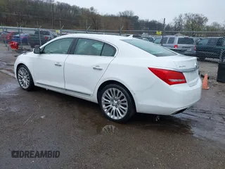 2014 Buick LaCrosse Premium II with VIN 1G4GF5G39EF305460, listed as a IAAI auction lot 41951229 with 127,188 mi miles and . Bid and sale history available at DreamBid. Image 3.