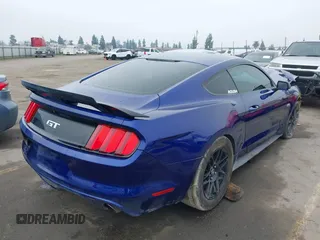 2016 Ford Mustang GT with VIN 1FA6P8CF1G5230668, listed as a IAAI auction lot 41359906 with 107,060 mi miles. Bid and sale history available at carsss.com. Image 4.