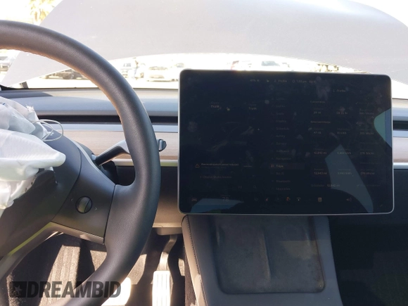 2023 Tesla Model Y Performance with VIN 7SAYGDEF5PF823122, listed as a IAAI auction lot 41546480 with 12,943 mi miles and . Bid and sale history available at DreamBid. Image 17.
