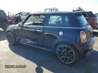 2012 MINI Hardtop S with VIN WMWSV3C59CT387246, listed as a Copart auction lot 61766125 with 155,156 mi miles and Salvage title. Bid and sale history available at DreamBid. Image 2.