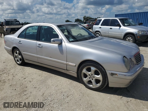 2002 Mercedes-Benz E-Class with VIN WDBJF65J02B495961, listed as a Copart auction lot 73844554 with 99,380 mi miles and Salvage Title. Bid and sale history available at carsss.com. Image 4.