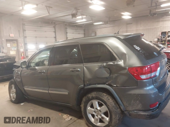 2012 Jeep Grand Cherokee Laredo with VIN 1C4RJFAG3CC209142, listed as a IAAI auction lot 41978296 with 201,796 mi miles. Bid and sale history available at carsss.com. Image 14.