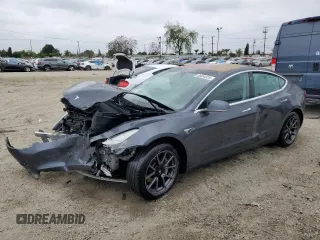 2018 Tesla Model 3 Long Range Battery z VIN 5YJ3E1EA7JF123805, wystawiony jako Copart lot #56034325 z przebiegiem 90 249 mil mil oraz Szkoda całkowita • Salvage title. Historia ofert i sprzedaży dostępna na DreamBid. Obrazek 1.