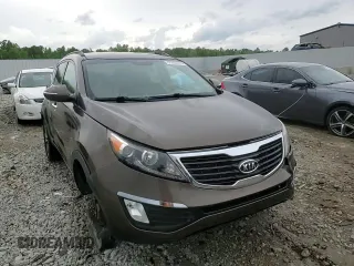2012 Kia Sportage EX z VIN KNDPC3A25C7187402, wystawiony jako Copart lot #57853615 z przebiegiem 175 903 mil mil oraz Szkoda całkowita • Salvage title. Historia ofert i sprzedaży dostępna na DreamBid. Obrazek 14.