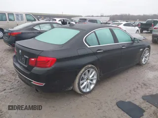 2014 BMW 5 Series 535i xDrive with VIN WBA5B3C56ED537753, listed as a IAAI auction lot 41054663 with 138,684 mi miles and . Bid and sale history available at carsss.com. Image 4.