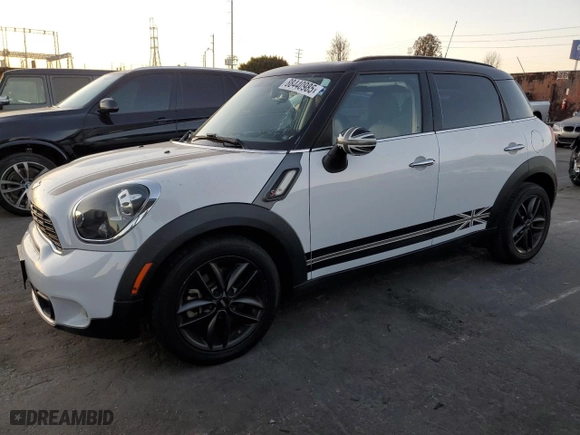 2014 MINI Cooper Countryman S with VIN WMWZC3C56EWP25014, listed as a Copart auction lot 88440985 with 95,058 mi miles and Salvage Title. Bid and sale history available at carsss.com. Image 1.