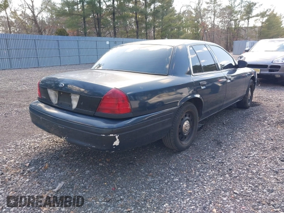 2006 Ford Police Interceptor z VIN 2FAHP71W86X156281, wystawiony jako IAAI lot #41751681 z przebiegiem 125 664 mil mil oraz . Historia ofert i sprzedaży dostępna na DreamBid. Obrazek 4.