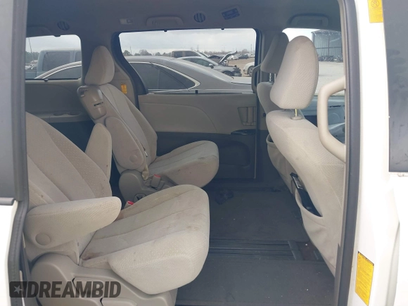 2014 Toyota Sienna LE AAS with VIN 5TDKK3DC6ES526159, listed as a IAAI auction lot 41522210 with 123,563 mi miles and . Bid and sale history available at DreamBid. Image 8.