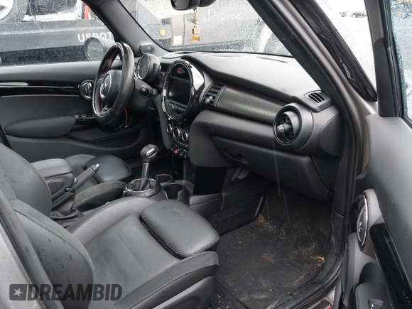 2017 MINI Hardtop 4 Door Cooper S z VIN WMWXU3C58H2D33073, wystawiony jako IAAI lot #41913081 z przebiegiem 51 631 mil mil oraz . Historia ofert i sprzedaży dostępna na DreamBid. Obrazek 5.