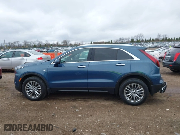 2024 Cadillac XT4 AWD Premium Luxury with VIN 1GYFZDR45RF143981, listed as a IAAI auction lot 42032787 with 14,700 mi miles and . Bid and sale history available at DreamBid. Image 14.