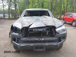 2022 Toyota Tacoma SR with VIN 3TYAX5GN1NT042099, listed as a IAAI auction lot 42081791 with 38,621 mi miles and . Bid and sale history available at DreamBid. Image 6.