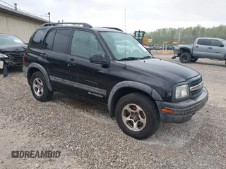 2004 Chevrolet Tracker ZR2 z VIN 2CNBJ734646907924, wystawiony jako IAAI lot #42088809 z przebiegiem 98 797 mil mil oraz . Historia ofert i sprzedaży dostępna na DreamBid. Obrazek 1.