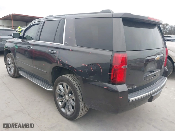 2015 Chevrolet Tahoe LTZ with VIN 1GNSCCKC6FR262769, listed as a IAAI auction lot 41389535 with 196,767 mi miles. Bid and sale history available at carsss.com. Image 3.