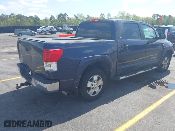 2010 Toyota Tundra with VIN 5TFEY5F18AX081754, listed as a IAAI auction lot 41924616 with 274,507 mi miles and . Bid and sale history available at DreamBid. Image 4.