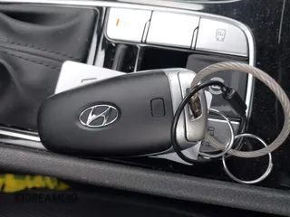 2024 Hyundai Tucson SEL with VIN 5NMJBCDE1RH295953, listed as a IAAI auction lot 42140368 with 39,024 mi miles. Bid and sale history available at carsss.com. Image 11.