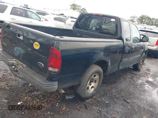 2002 Ford F-150 XL with VIN 1FTRX17252NA19861, listed as a IAAI auction lot 41304648 with 279,277 mi miles. Bid and sale history available at carsss.com. Image 4.