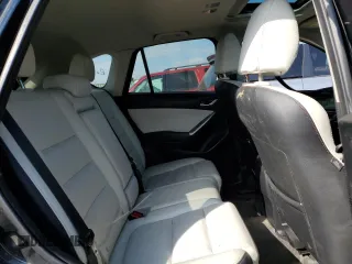 2016 Mazda CX-5 Grand Touring with VIN JM3KE4DY8G0719113, listed as a Copart auction lot 52160285 with 259,365 mi miles and Salvage Title. Bid and sale history available at carsss.com. Image 10.