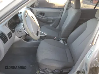 2003 Hyundai Accent GL with VIN KMHCG45C93U496038, listed as a Copart auction lot 87260904 with 104,251 mi miles and Salvage Title. Bid and sale history available at carsss.com. Image 7.