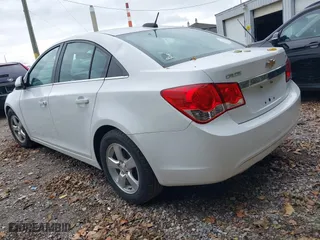 2015 Chevrolet Cruze LT with VIN 1G1PC5SB4F7139171, listed as a IAAI auction lot 42138107 with 185,400 mi miles. Bid and sale history available at carsss.com. Image 3.