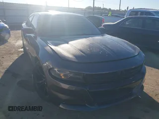 2018 Dodge Charger SXT with VIN 2C3CDXBG6JH126031, listed as a IAAI auction lot 41400041 with 127,906 mi miles and . Bid and sale history available at DreamBid. Image 1.
