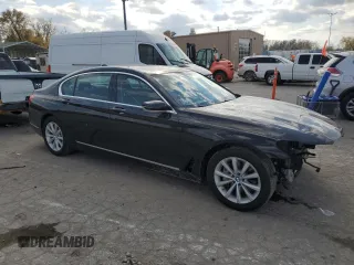 2018 BMW 7 Series 740i xDrive with VIN WBA7E4C54JGV23901, listed as a Copart auction lot 77322824 with 70,922 mi miles and Salvage Title. Bid and sale history available at carsss.com. Image 4.