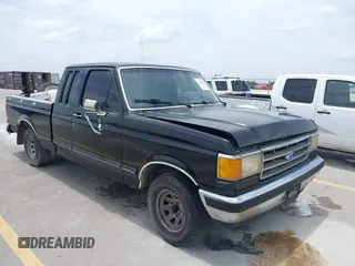 1990 Ford F-150 with VIN 1FTEX15N0LKA06904, listed as a IAAI auction lot 42603529 with 473,180 mi miles and . Bid and sale history available at DreamBid. Image 1.