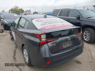 2022 Toyota Prius L Eco with VIN JTDKAMFU3N3190079, listed as a IAAI auction lot 41771356 with 52,607 mi miles and . Bid and sale history available at DreamBid. Image 3.
