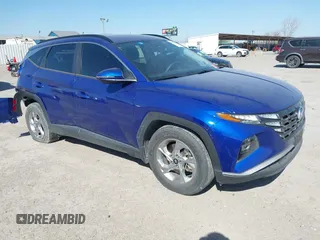 2023 Hyundai Tucson SEL z VIN 5NMJB3AE9PH184794, wystawiony jako IAAI lot #41836869 z przebiegiem 21 589 mil mil oraz . Historia ofert i sprzedaży dostępna na DreamBid. Obrazek 1.