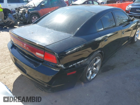2012 Dodge Charger Police with VIN 2C3CDXAT4CH150703, listed as a IAAI auction lot 41679874 with 226,065 mi miles. Bid and sale history available at carsss.com. Image 4.