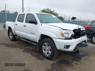 2014 Toyota Tacoma PreRunner z VIN 3TMJU4GNXEM172008, wystawiony jako IAAI lot #42427701 z przebiegiem 164 987 mil mil oraz . Historia ofert i sprzedaży dostępna na DreamBid. Obrazek 1.