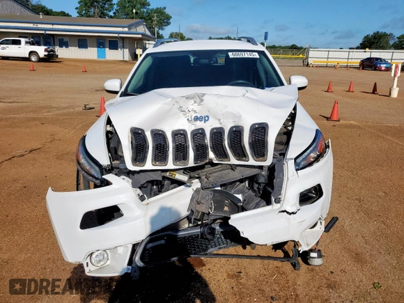 2016 Jeep Cherokee Latitude with VIN 1C4PJLCB8GW125748, listed as a Copart auction lot 60697145 with 118,276 mi miles and Salvage title. Bid and sale history available at DreamBid. Image 5.