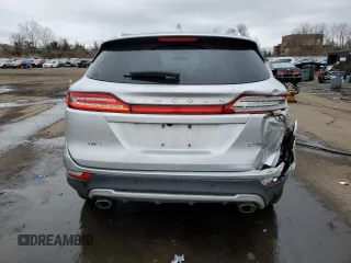 2015 Lincoln MKC z VIN 5LMCJ2A94FUJ10689, wystawiony jako Copart lot #49952045 z przebiegiem 128 040 mil mil oraz Szkoda całkowita • Salvage title. Historia ofert i sprzedaży dostępna na DreamBid. Obrazek 6.