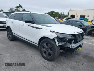 2025 Land Rover Range Rover Velar Dynamic SE with VIN SALYL2EX3SA398659, listed as a IAAI auction lot 41335449 with 14,875 mi miles and . Bid and sale history available at DreamBid. Image 1.